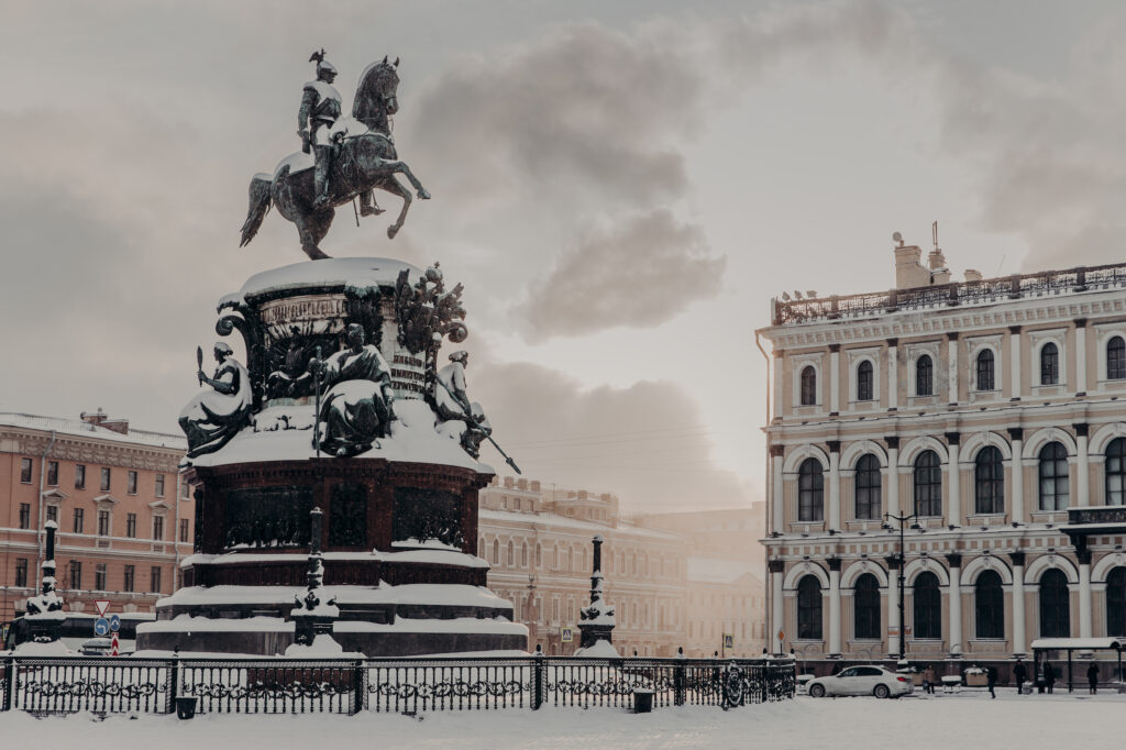 Monument to Nicholas I on Saint Isaac's Square in Saint Petersburg at Russia. Historical monument during winter weather. Snowy view. City`s landmarks.